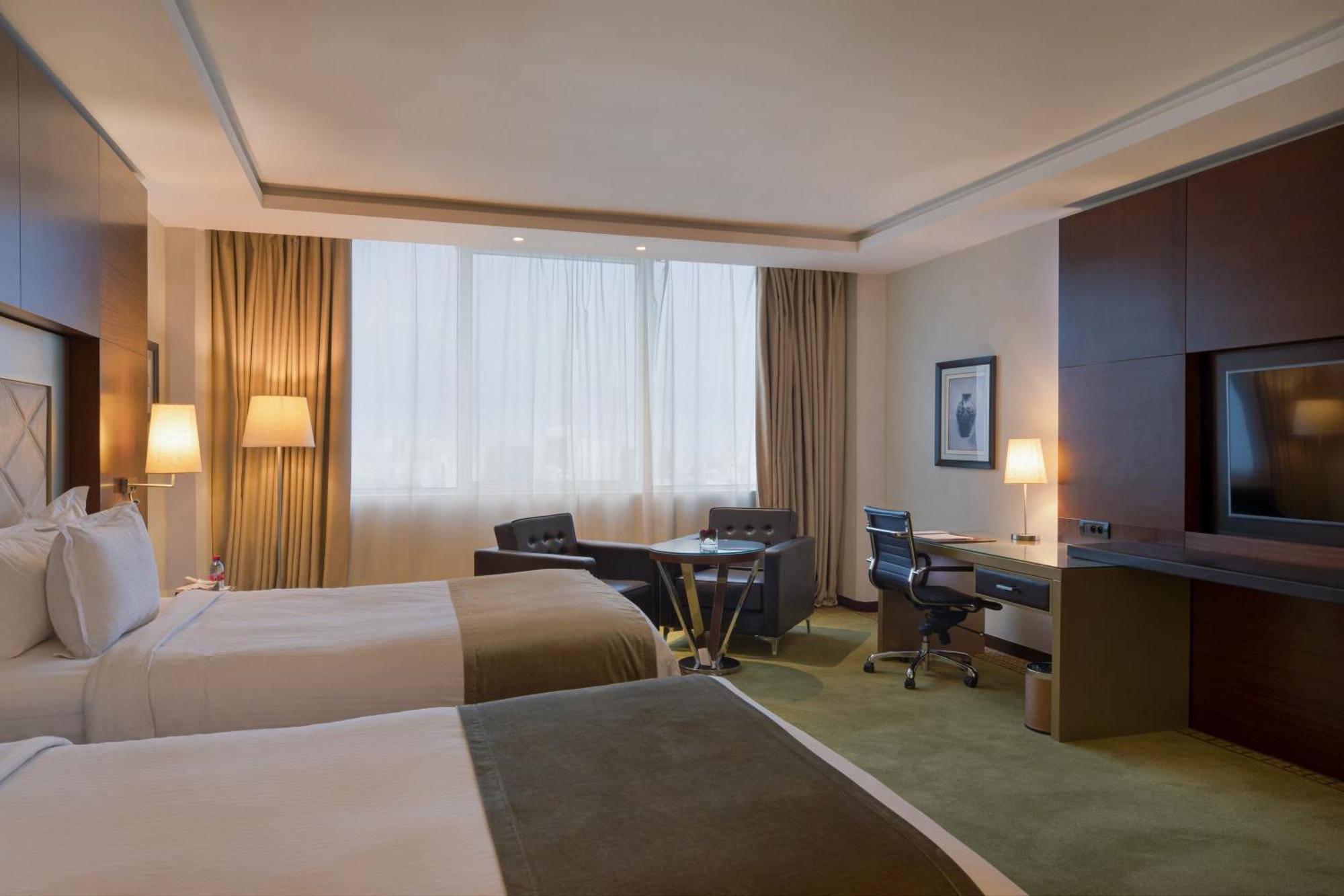 Grand Mogador City Center Casablanca Exterior foto A room at the hotel