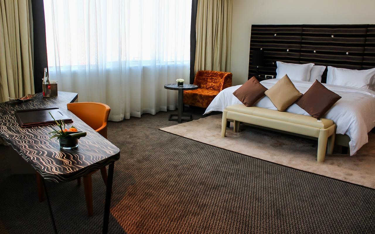 Grand Mogador City Center Casablanca Exterior foto A room at the hotel